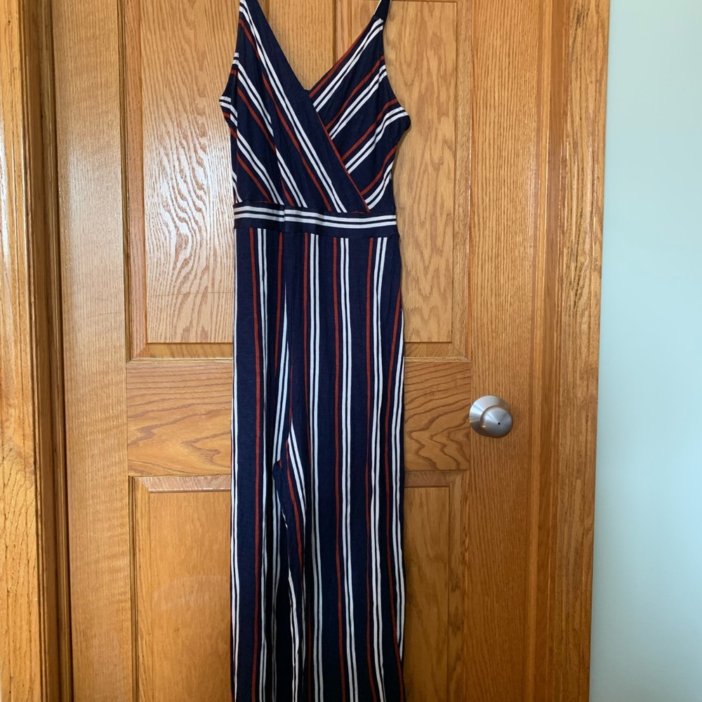 NWT. Size Jrs Lrge Romper by Pink Rose.